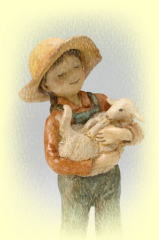 粘土作家Toshi（登志）による子羊を抱いている女の子の紙粘土作品
